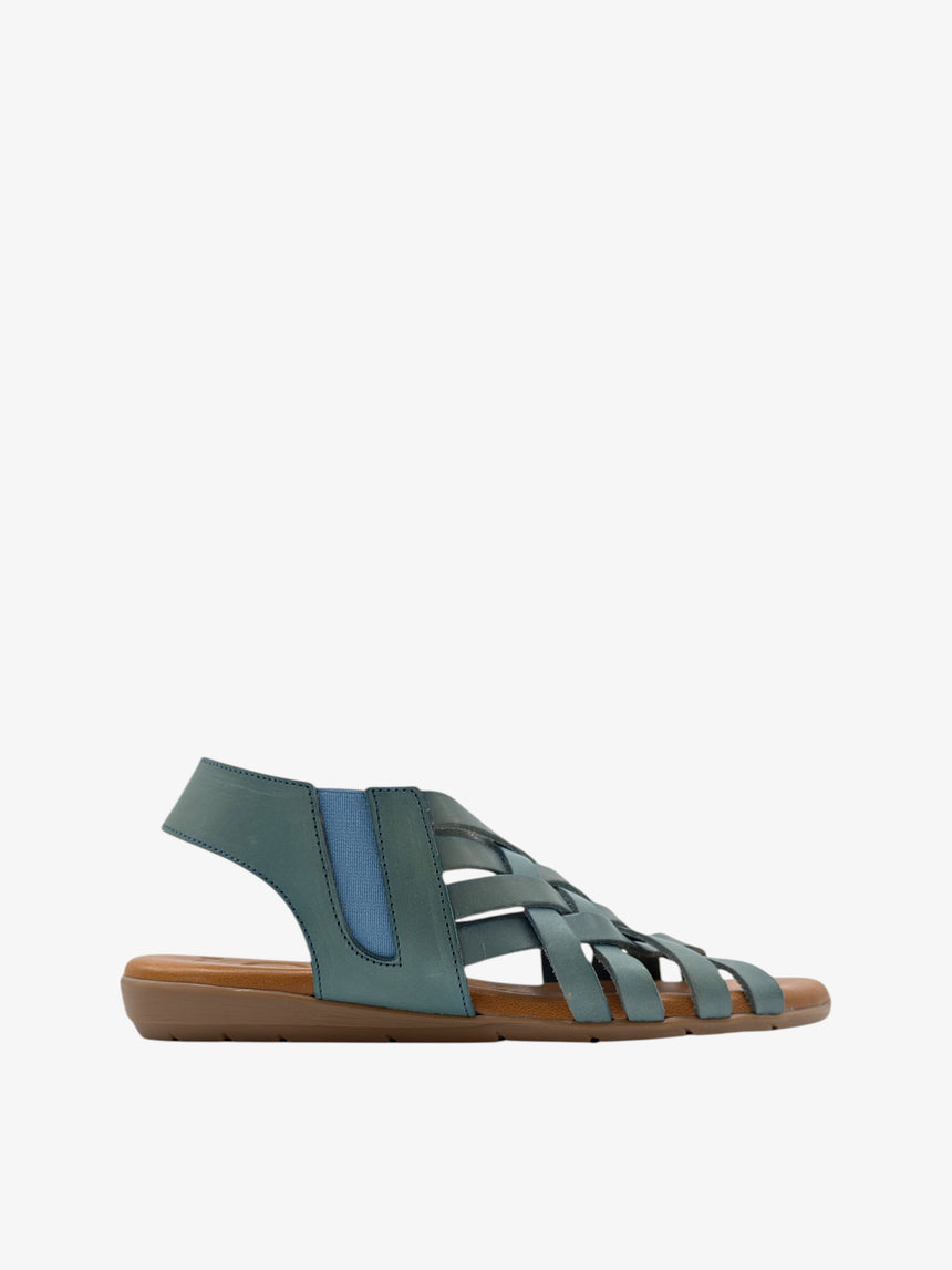 Sandalia plana de piel GRANADELLA azul de LOLA vista lateral